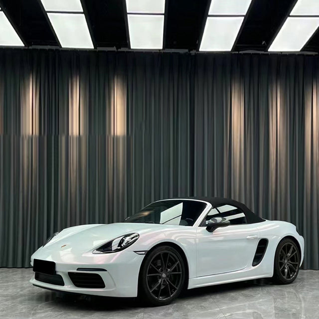 diamond pink white car wrap on a sports car