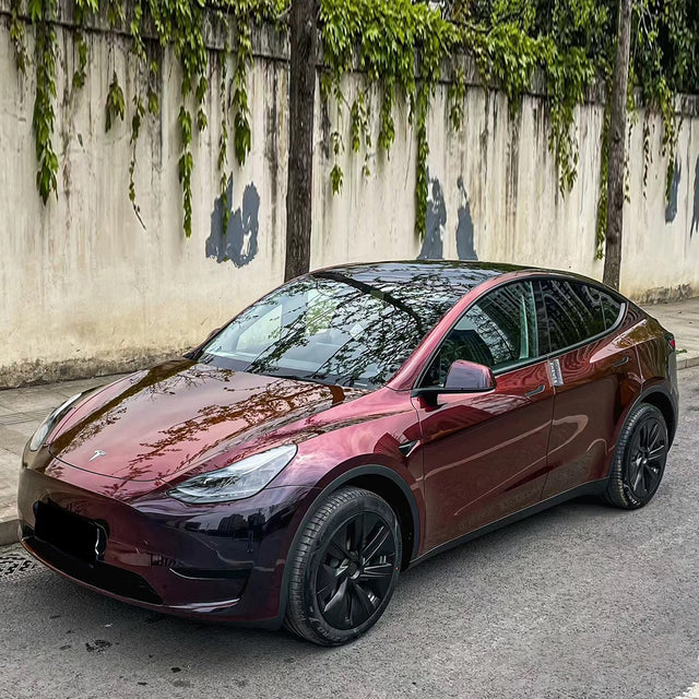 midnight red car wrap on a tesla model 3