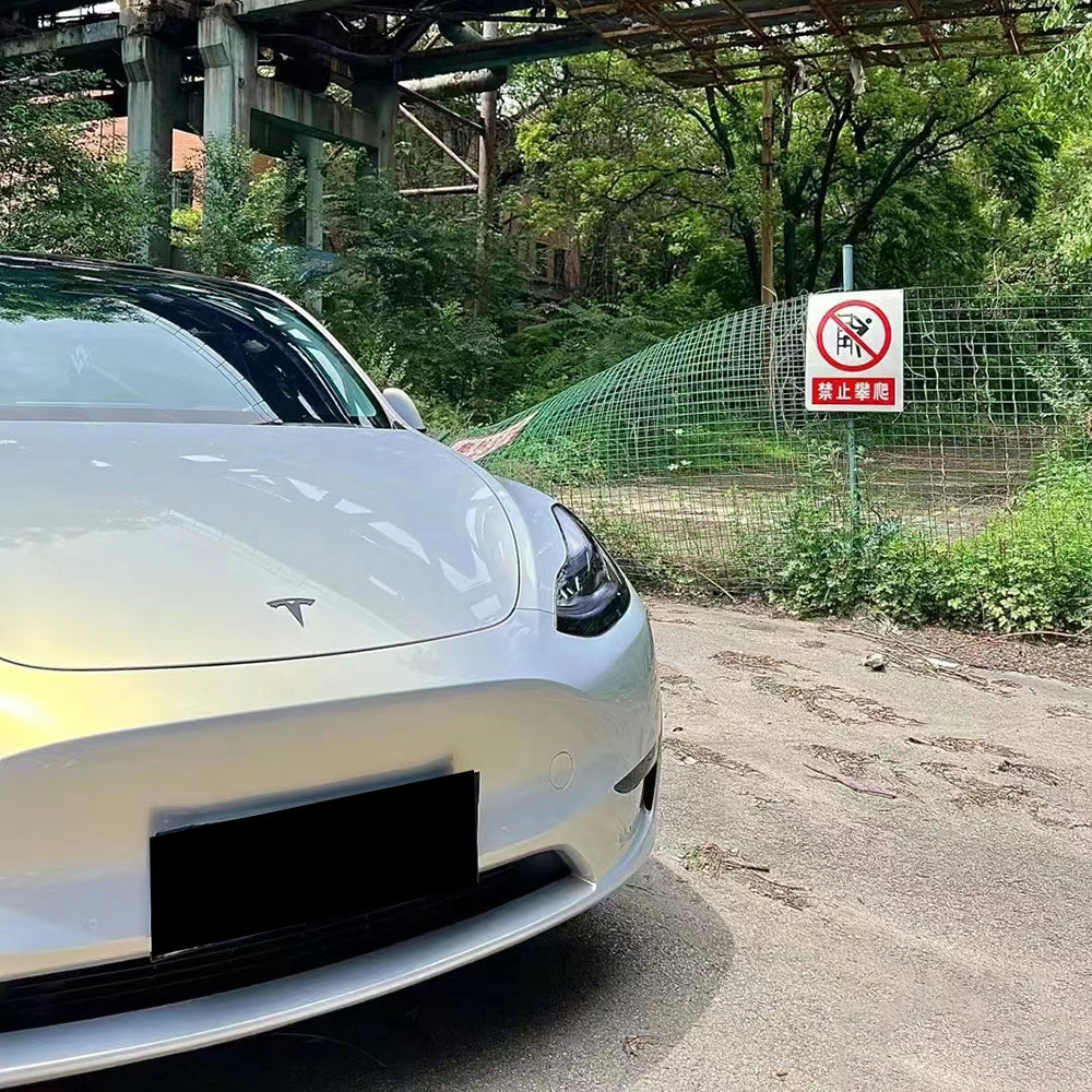 close up shot of glossy gold blue car wrap
