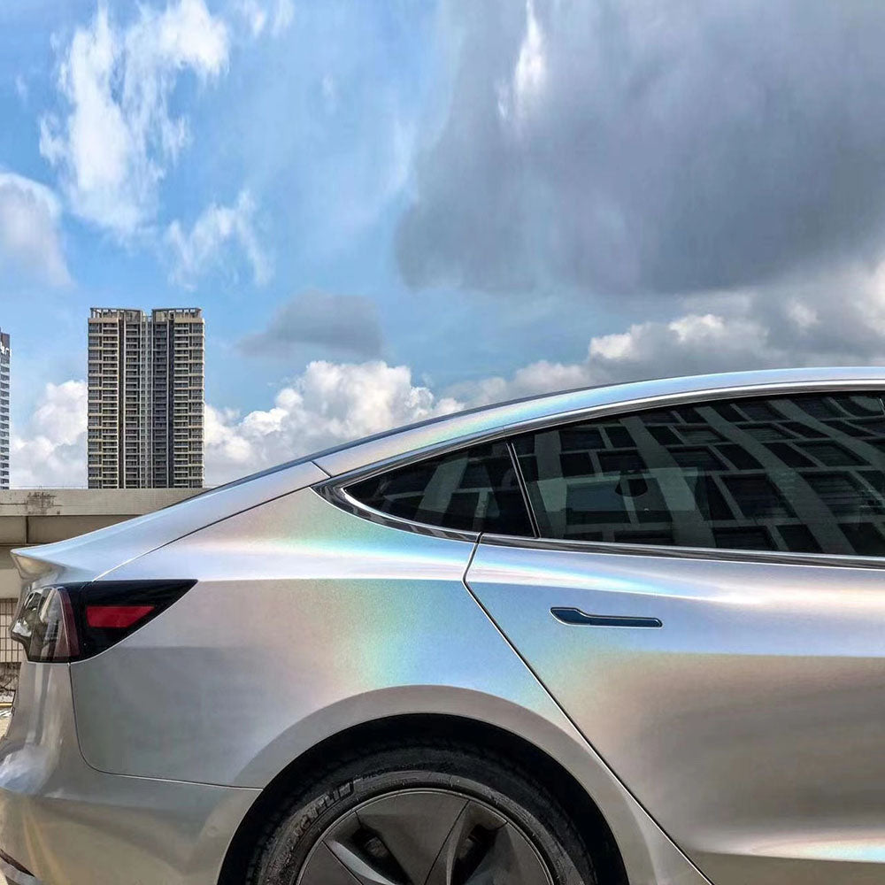 glossy iridescence laser white car wrap showcased on a car