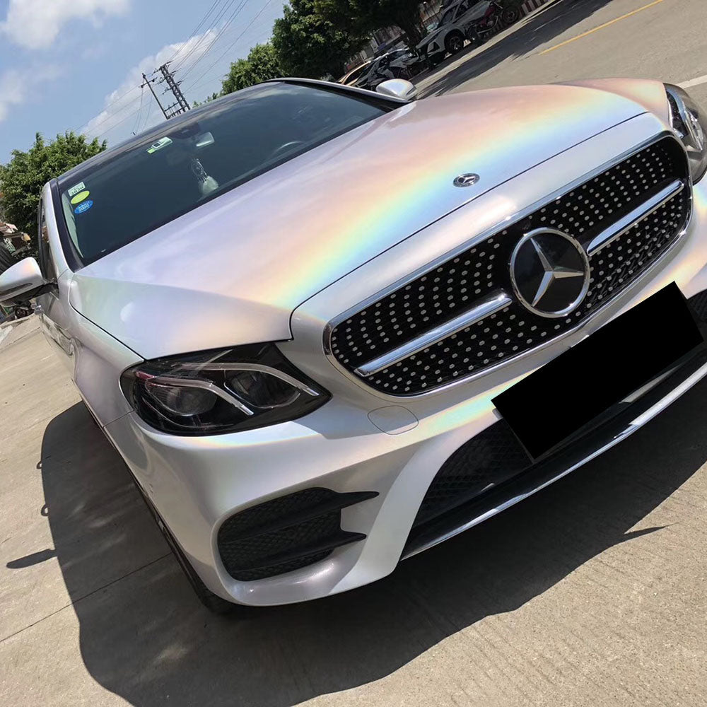 glossy iridescence laser white car wrap close up