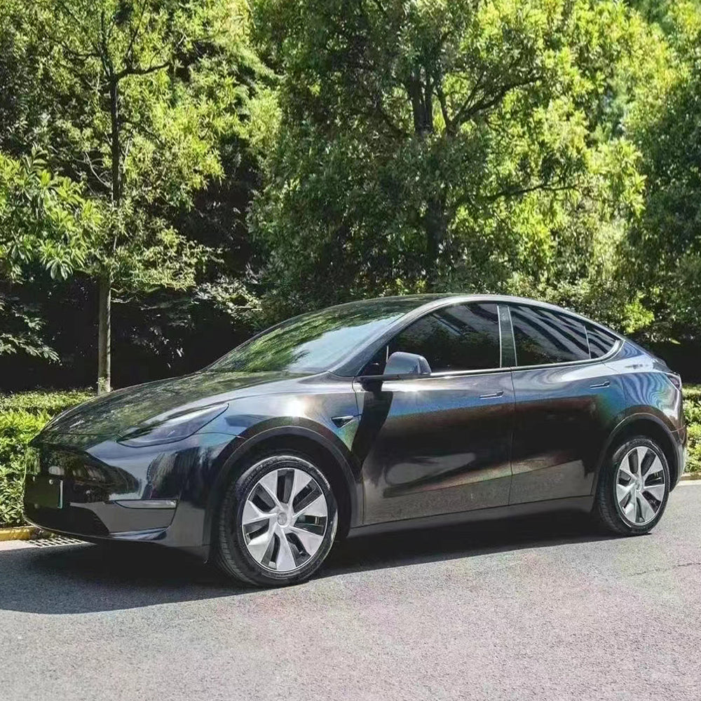 car wrapped in laser black car wrap
