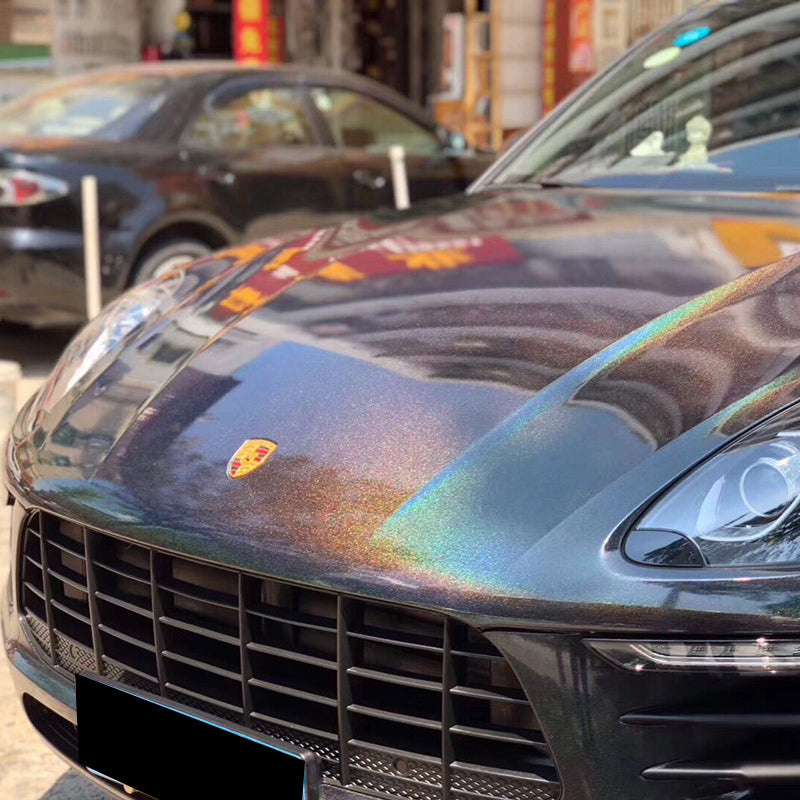 car wrapped in laser black color changing car wrap