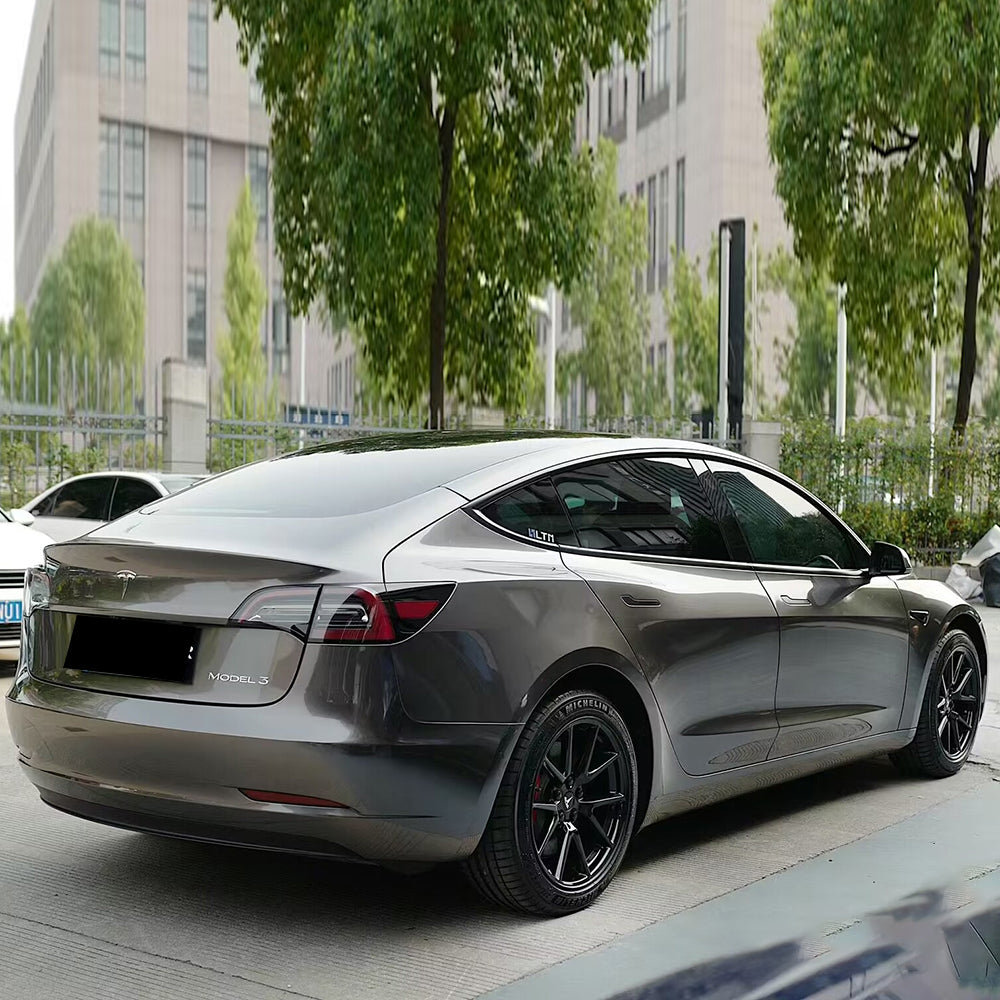 car wrapped in liquid gun grey vinyl wrap
