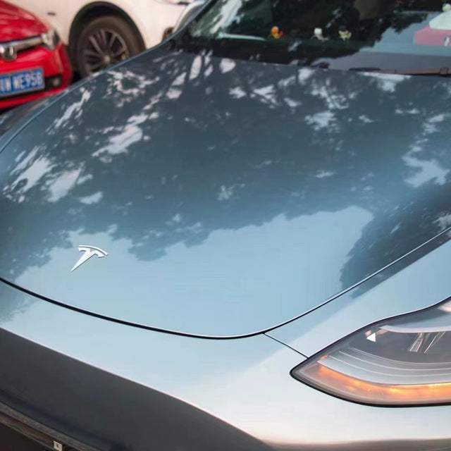 close up shot of liquid soma to blue car wrap