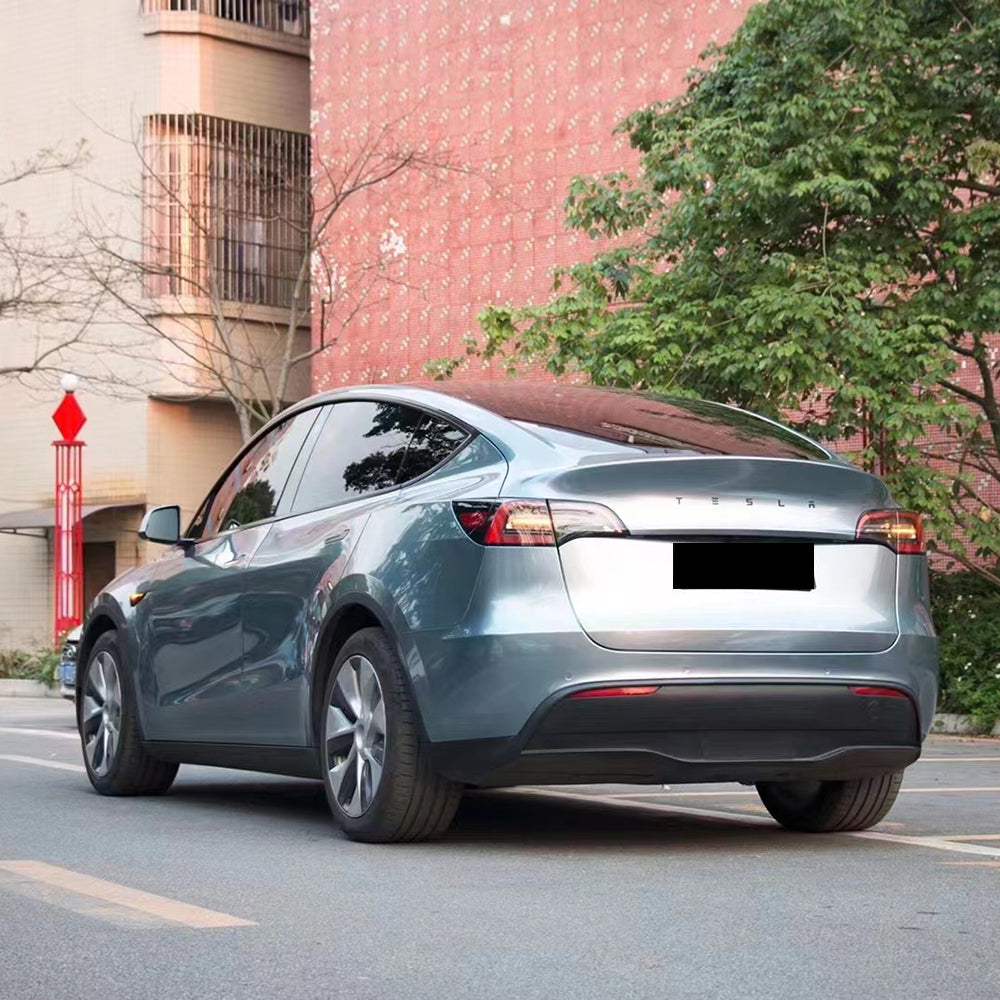car wrapped with liquid soma to blue car wrap