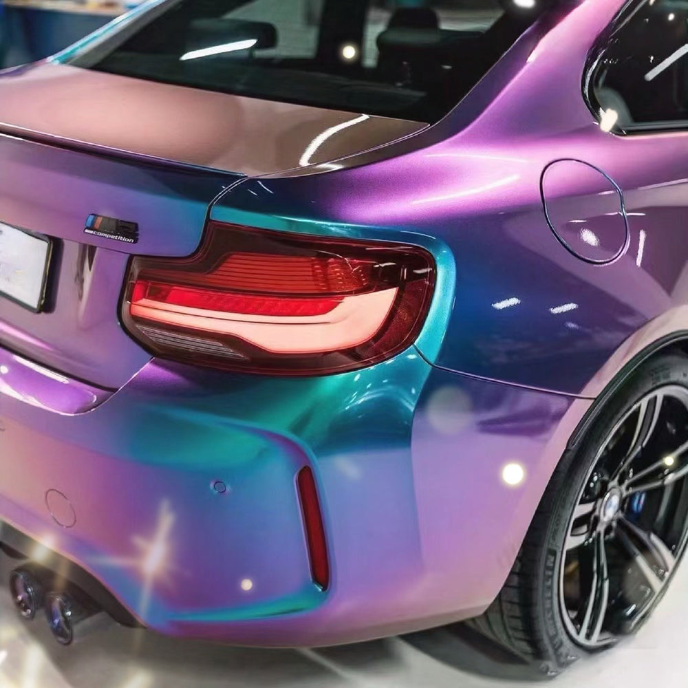 close up shot of bmw wrapped in magic spectral blue car wrap