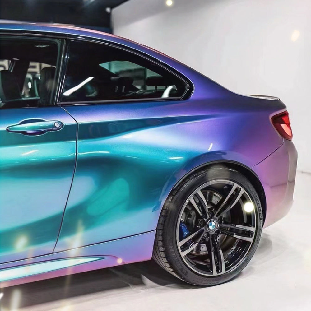 magic spectral blue car wrap on a sports car