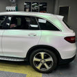 matte aurora white car wrap being installed