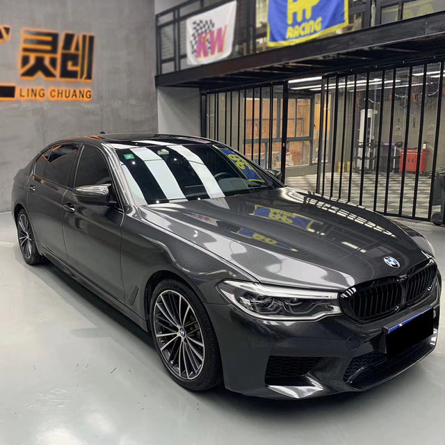 car wrapped in metallic dark black car wrap