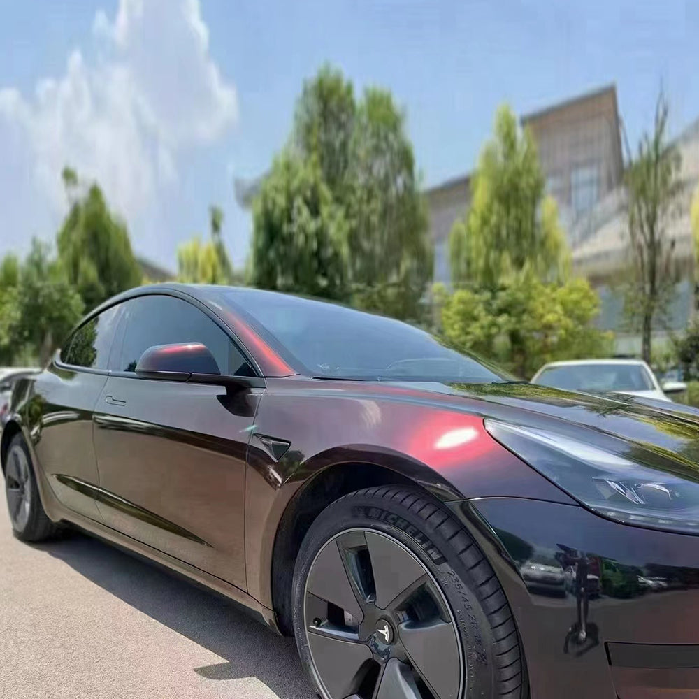 night elt glossy flip black red color shifting car wrap on tesla