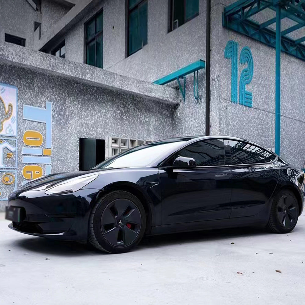 spar blue black car wrap installed on a car