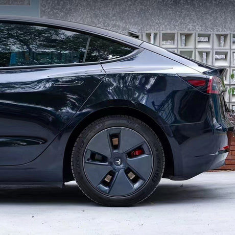 spar blue black car wrap close up rear shot