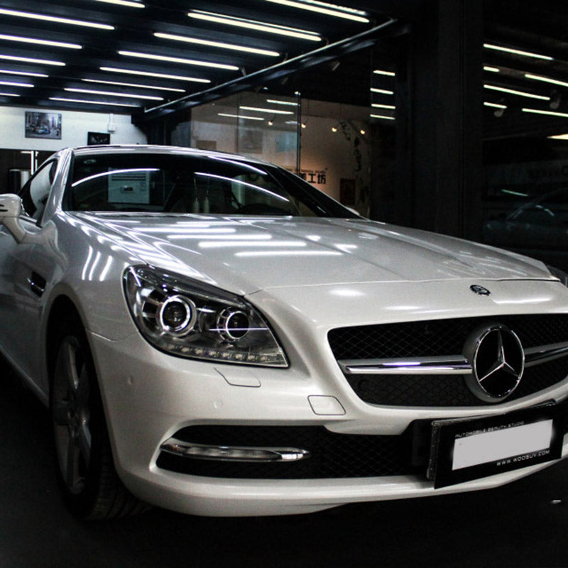 car wrapped in sparkle white car wrap