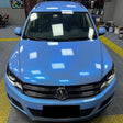 twin grey cyanine blue car wrap on a suv