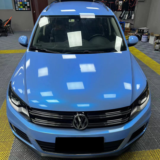 twin grey cyanine blue car wrap on a suv