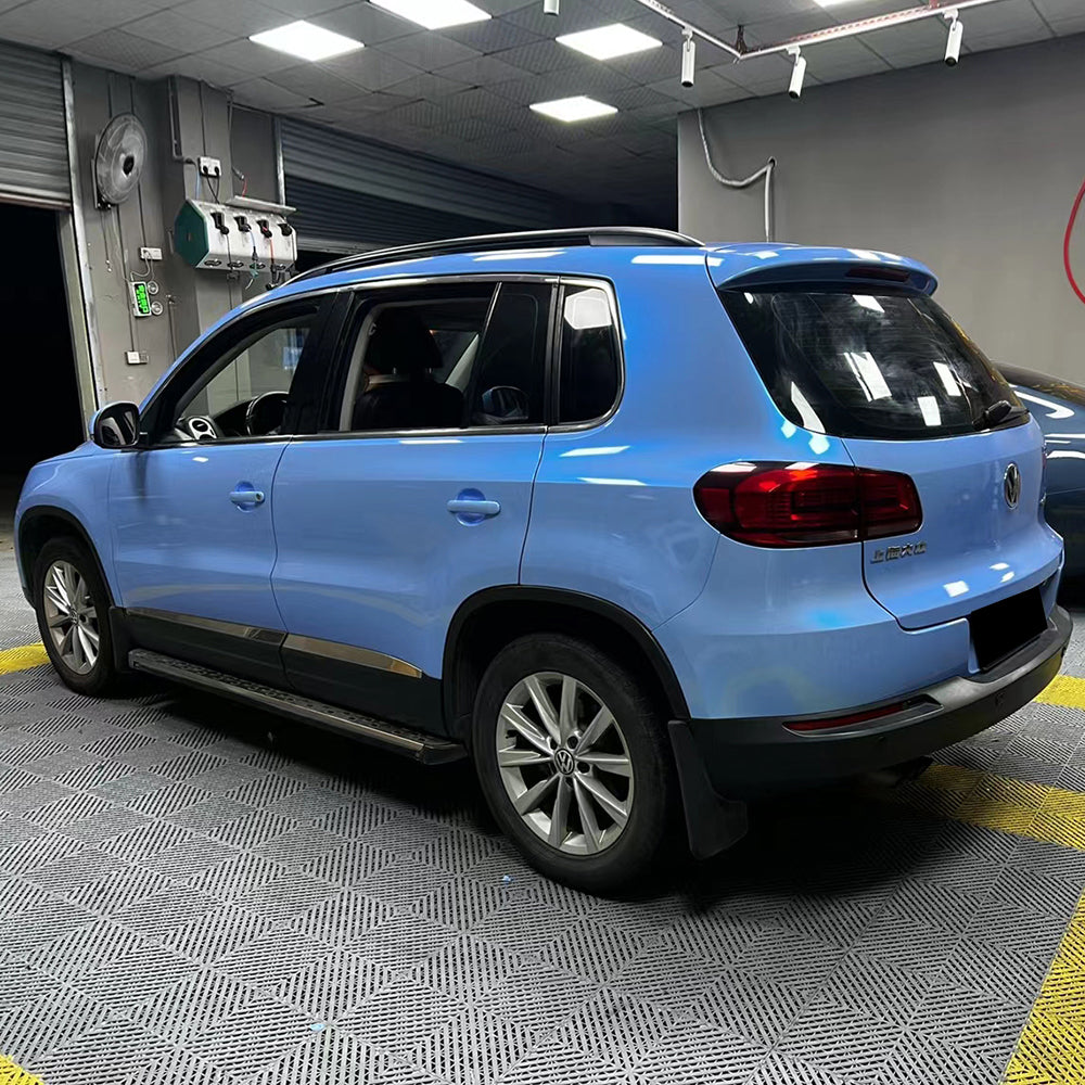 twin grey cyanine blue car wrap installation