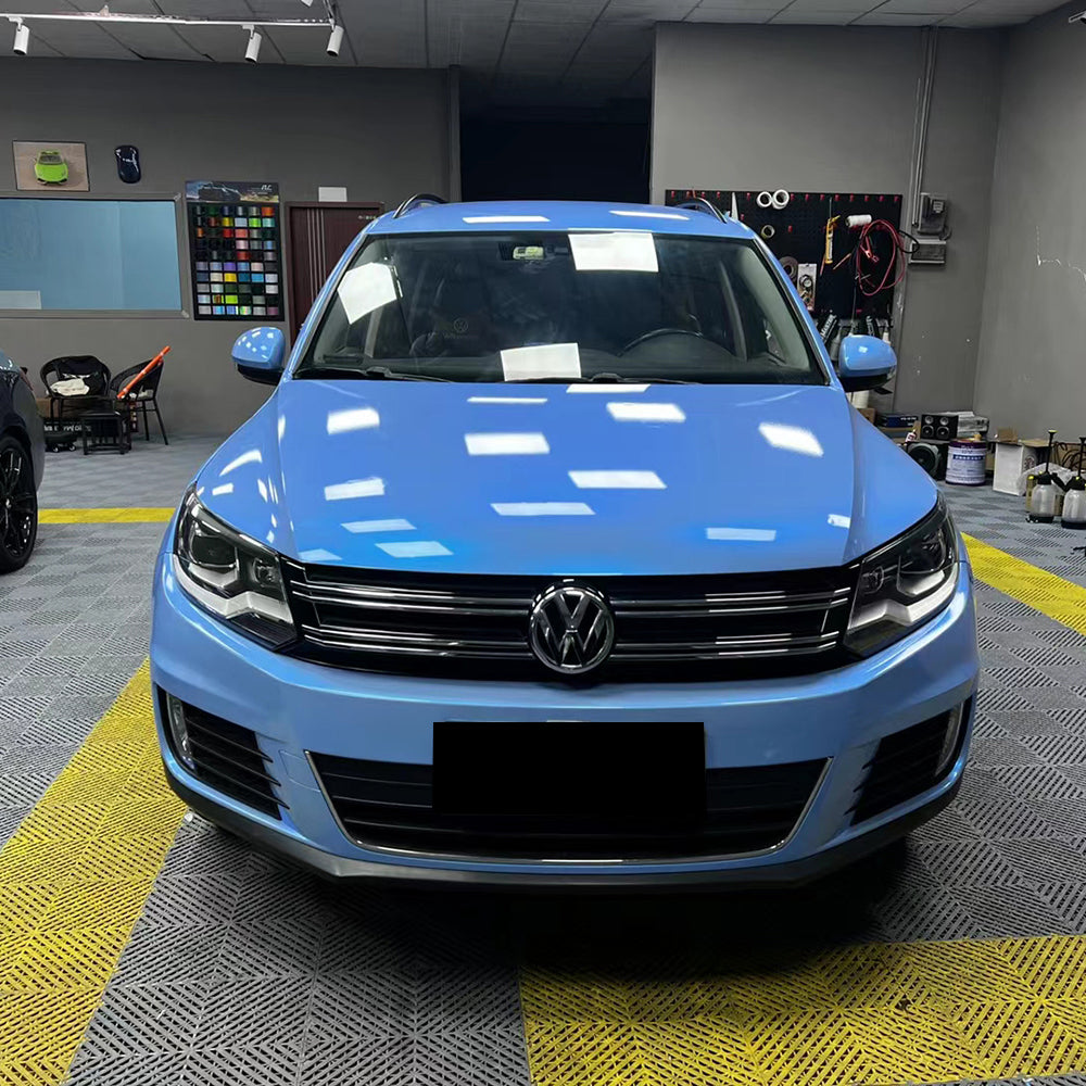 vehicle with a twin grey cyanine blue car wrap