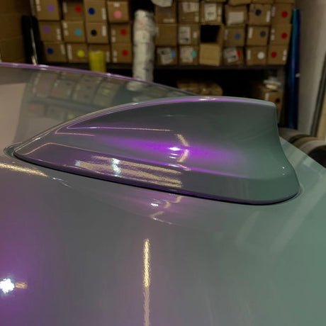 close up shot of twin grey purple car wrap