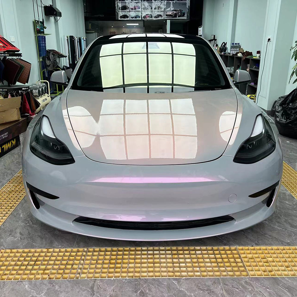 close up shot of a car wrapped in twin magic grey pink car wrap