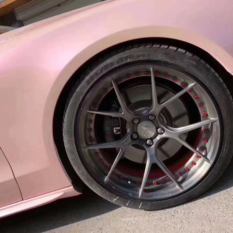 car wrapped in twin magic pink car wrap