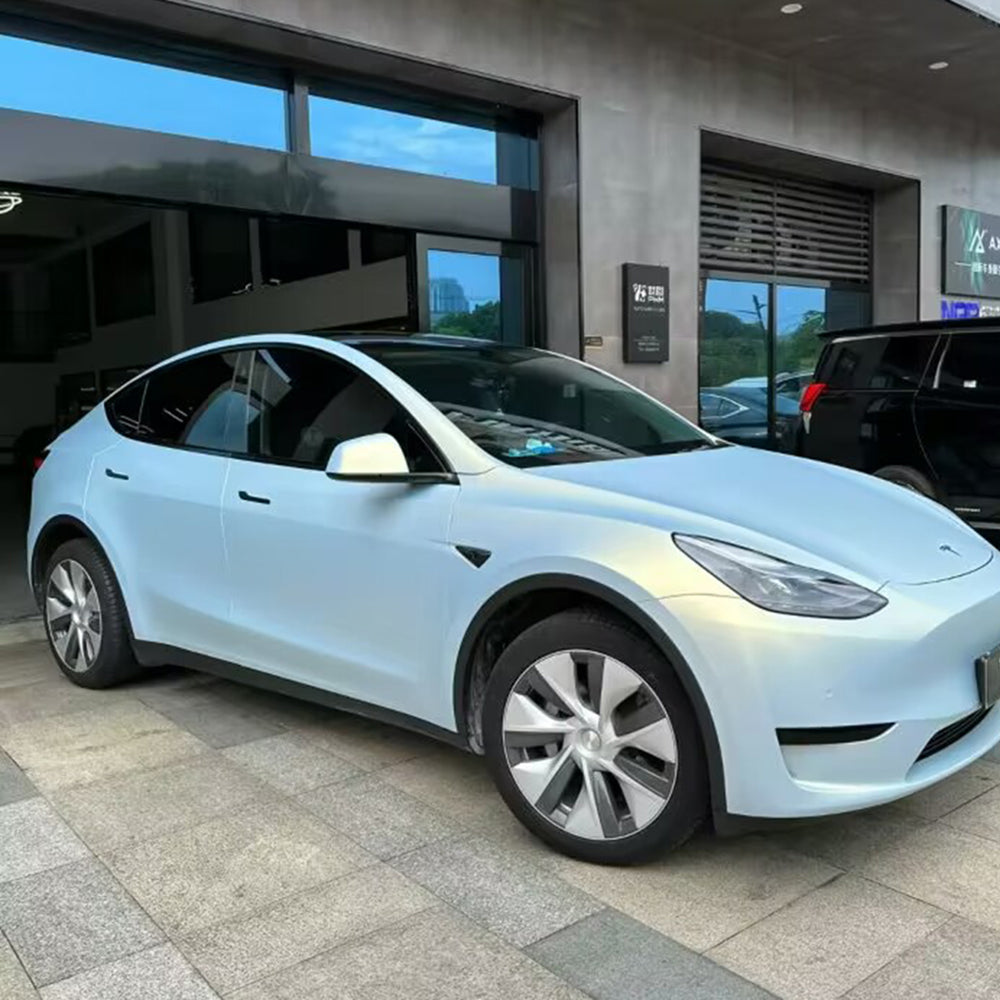 side view of a car wrapped in ultra matte gold blue color changing car wrap