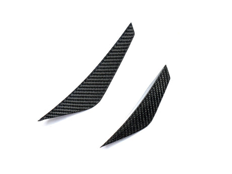 close up shot of dry carbon fiber canard set by autotecknic for g8x bmw