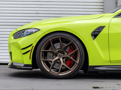 side shot of dry carbon fiber canard set by autotecknic for g8x bmw m3 and m4