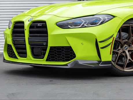 dry carbon fiber canard set by autotecknic on a g82 bmw m4