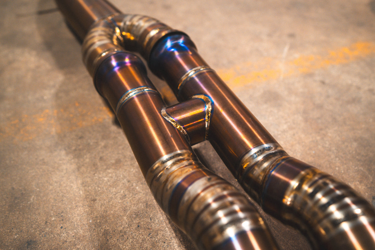 valvetronic designs exhaust welding showing on a titanium exhaust for bmw f8x