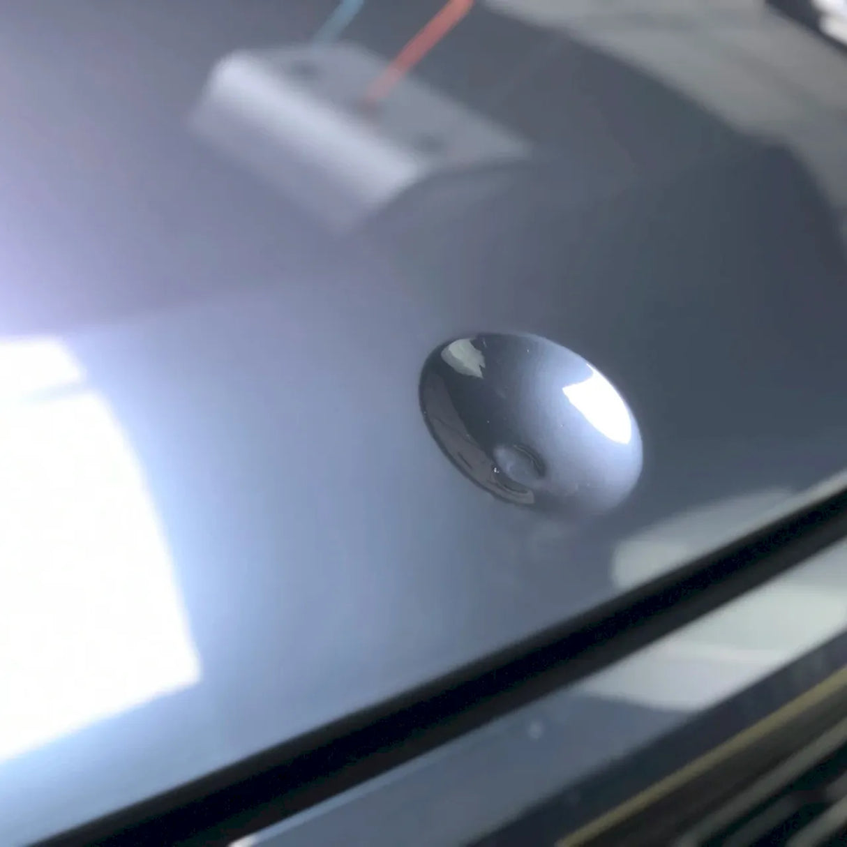 up close look of ceramic blue gray car wrap