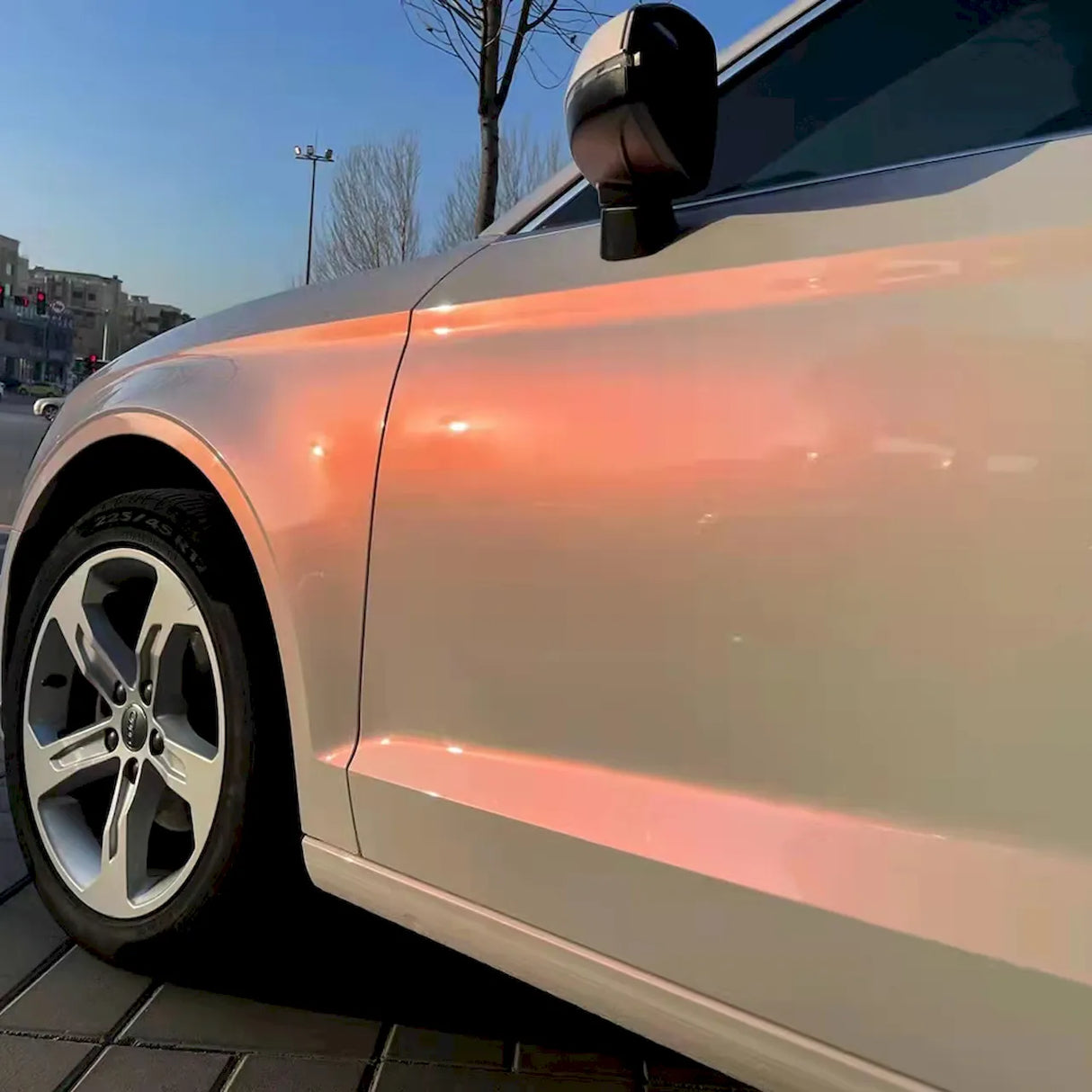 sparkling gloss pink car wrap with gold accents