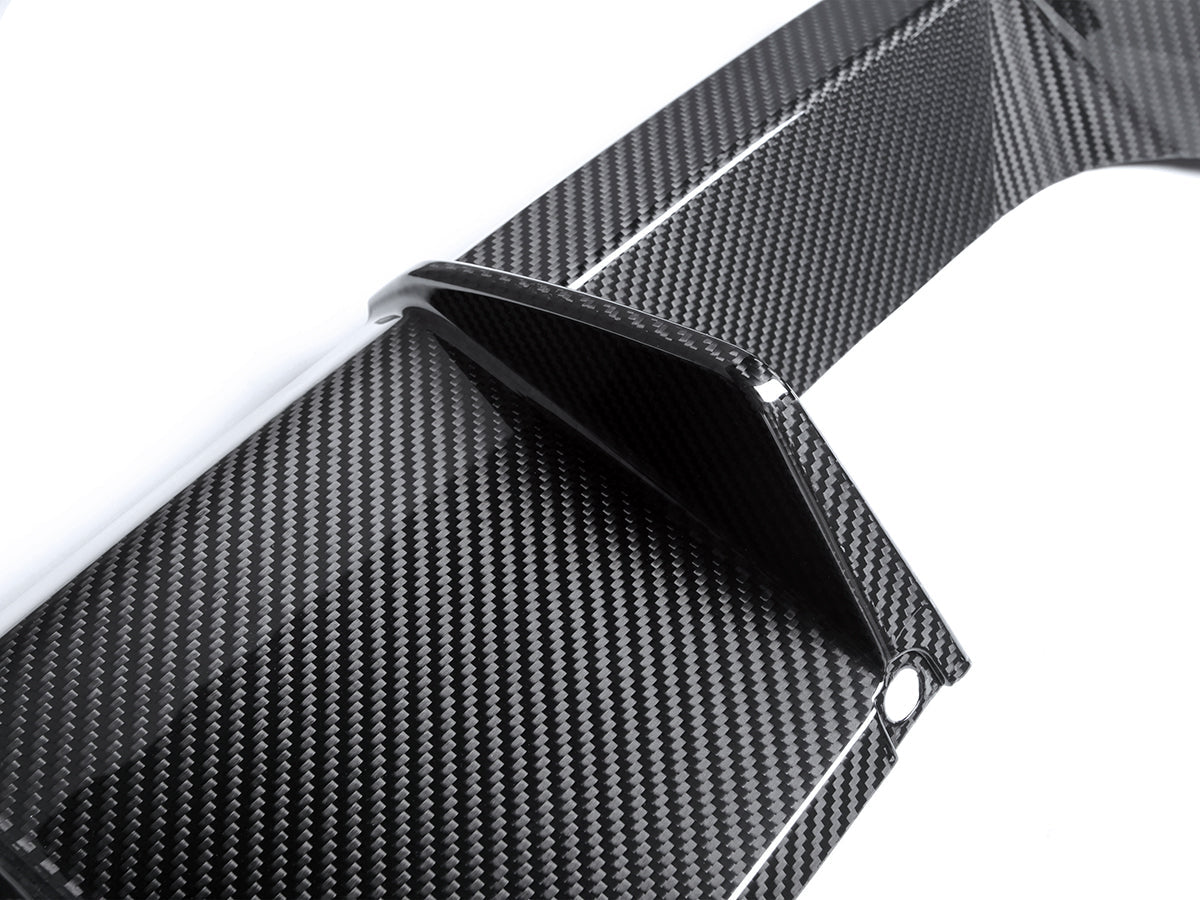 up close look at bmw g8x carbon fiber rear performante diffuser by autotecknic