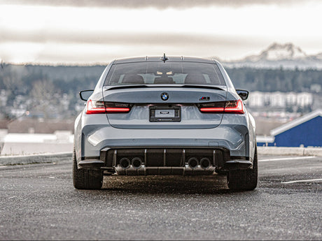 bmw m4 g80 with a carbon fiber rear performante diffuser by autotecknic