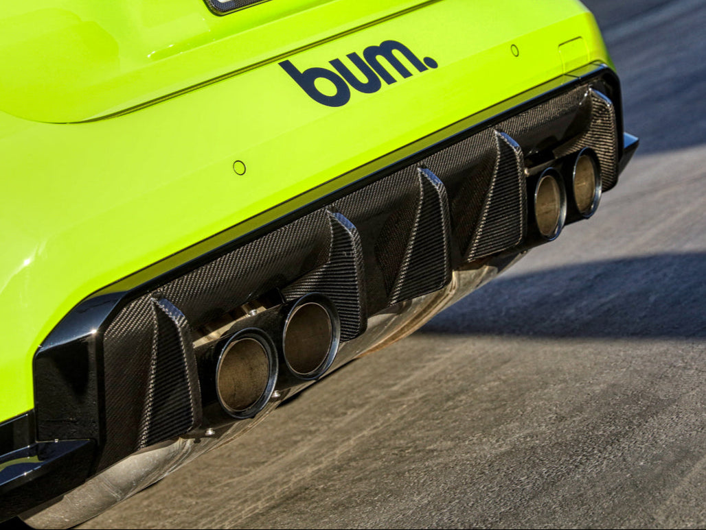 close up look at bmw m4 g82 carbon fiber rear performante diffuser by autotecknic