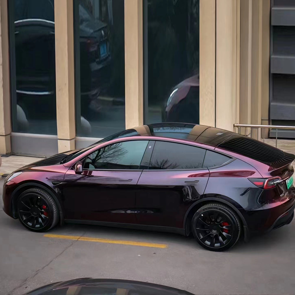 flowing phantom red car wrap vinyl on a tesla