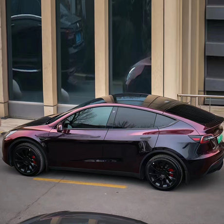 flowing phantom red car wrap vinyl on a tesla