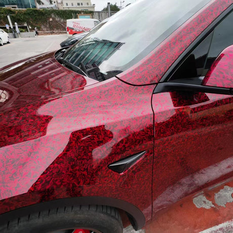 up close look of forged carbon red car wrap