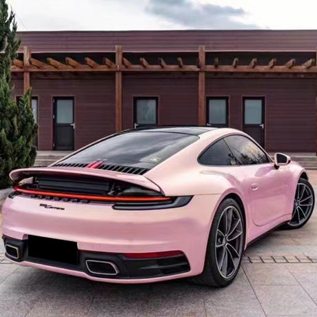 car with glazed gold pink car wrap installed