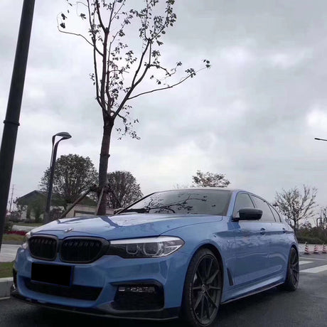 gloss abudhabi blue car wrap on a vehicle