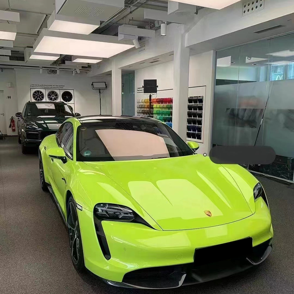 car getting wrapped in gloss acid green car wrap