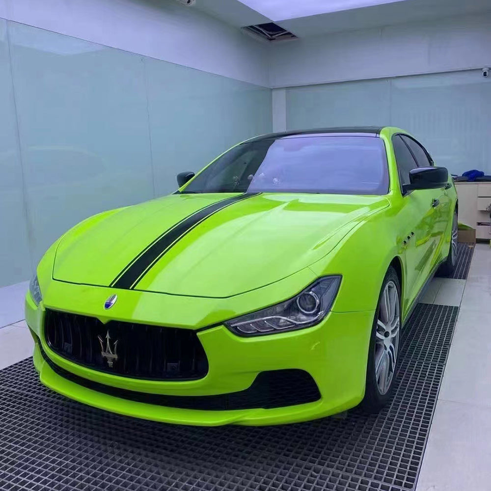 sports car wrapped in gloss apple green car wrap