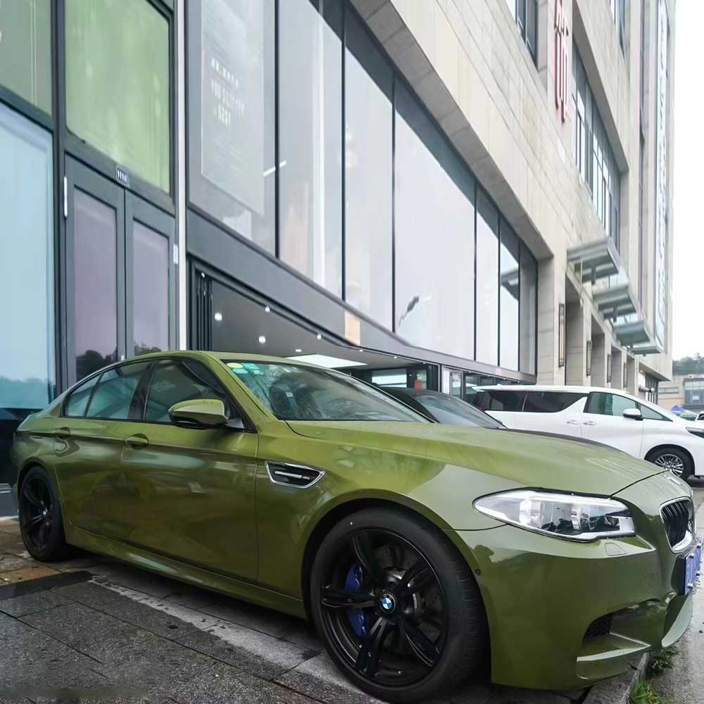 car wrapped in gloss battle green car wrap