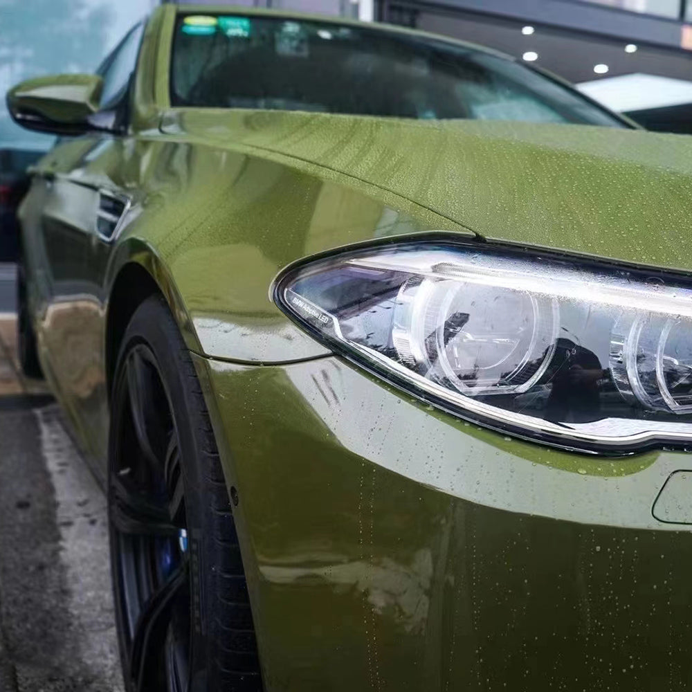 close up shot of gloss battle green car wrap