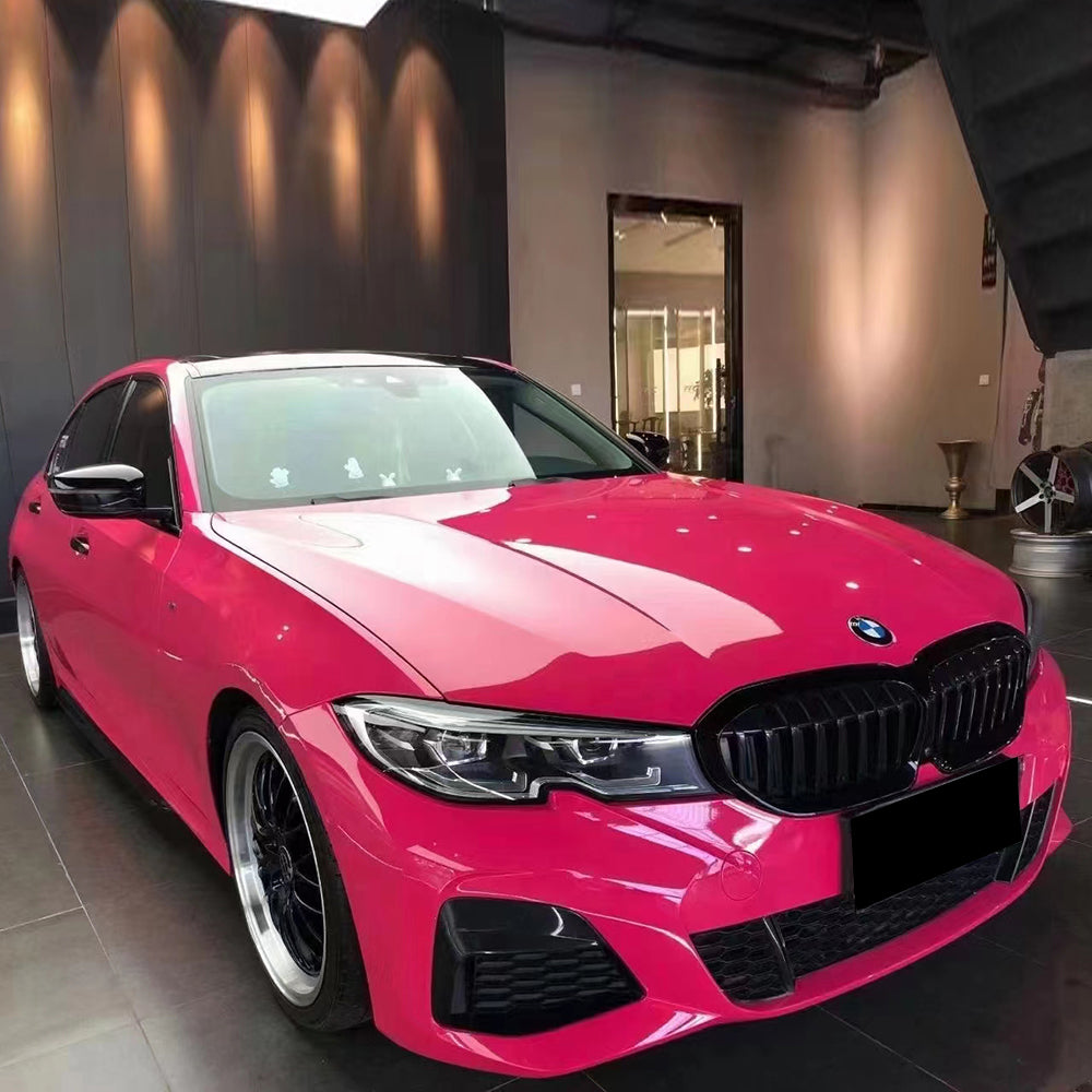 gloss beets purple car wrap installed on a vehicle