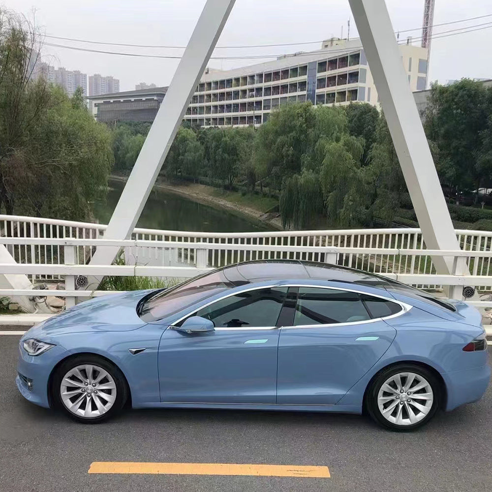 gloss blue haze car wrap on a car