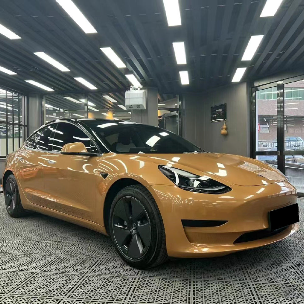gloss caramel brown car wrap installed on a vehicle