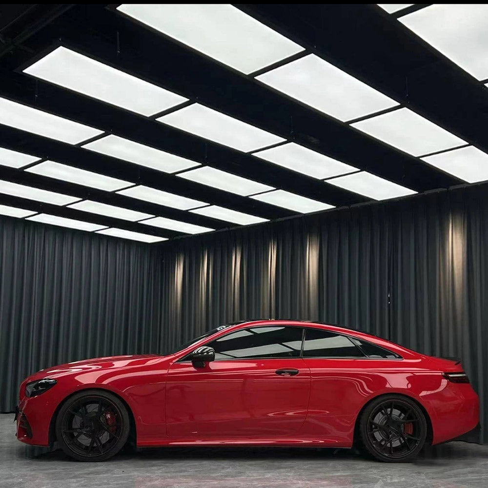 gloss carmine red car wrap on a vehicle