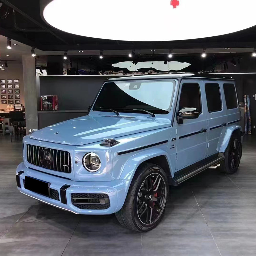 vehicle being wrapped in gloss china blue car wrap