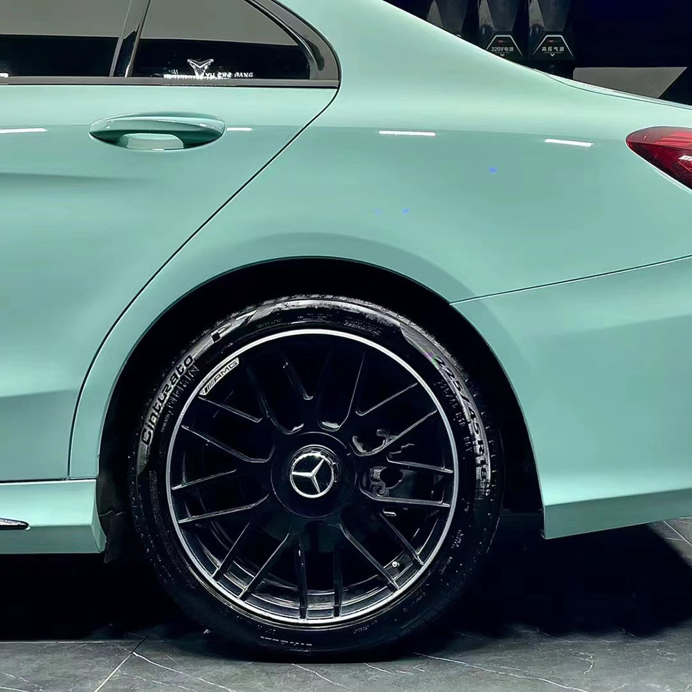 close up of gloss cragginess green car wrap